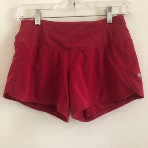 red lululemon shorts